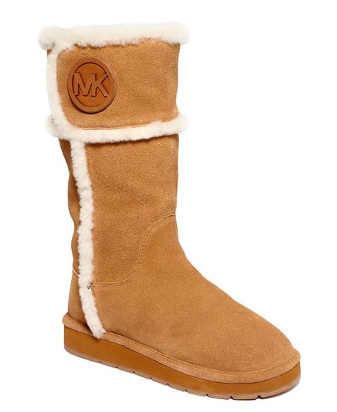 michael kors winter shearling ankle boots|Michael Kors adjustable buckle boots.